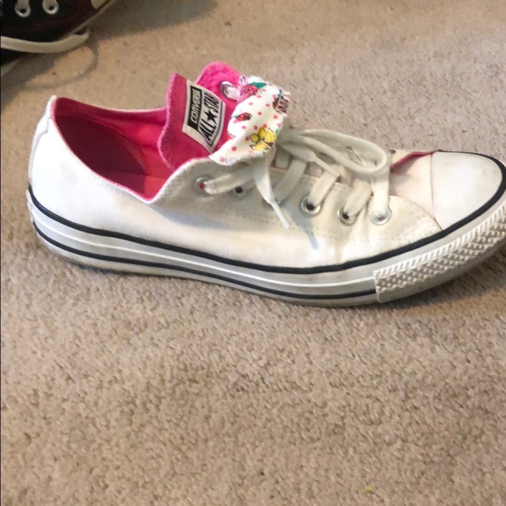 Pink and white Chuck taylors